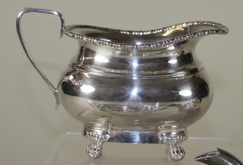 *A THREE PIECE SILVER TEA SERVICE Image