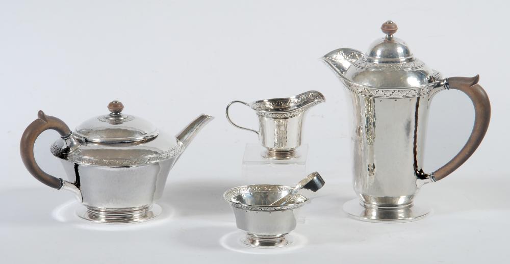 AN ARTS AND CRAFTS FIVE PIECE SILVER TEA SERVICE Image