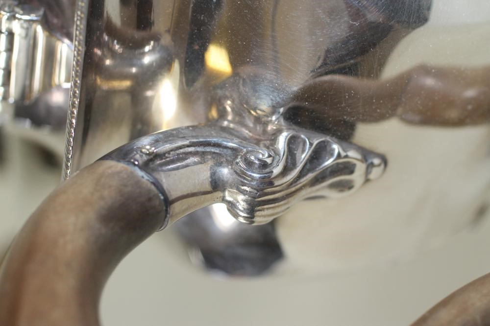 *A FOUR PIECE SILVER TEA SERVICE Image