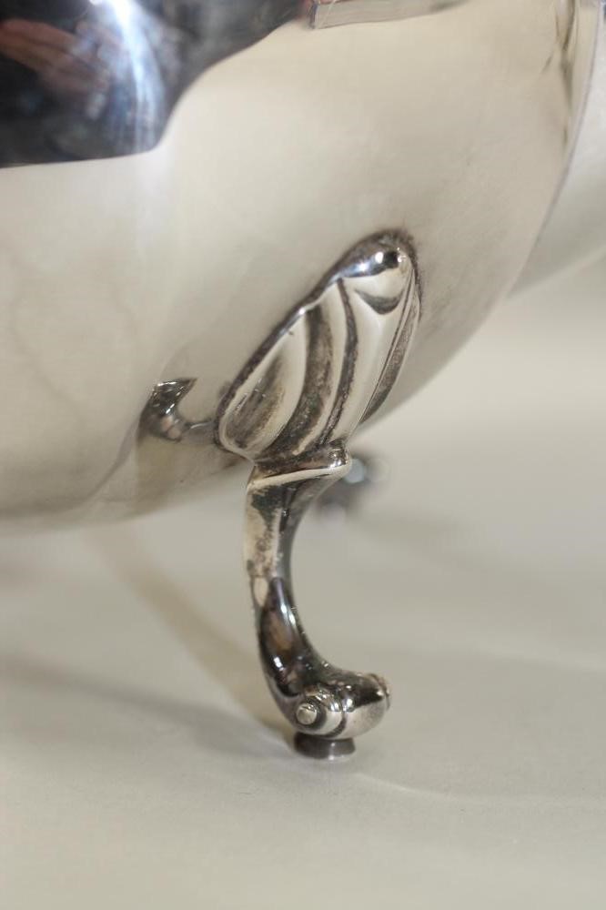 *A FOUR PIECE SILVER TEA SERVICE Image