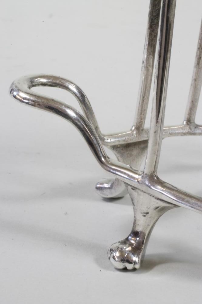 A SEVEN BAR SILVER TOASTRACK Image