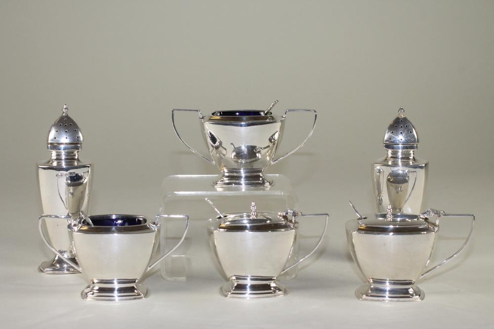 A COMPOSITE SIX PIECE SILVER CRUET Image