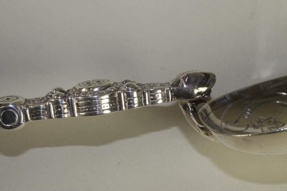 AN EDWARDIAN SILVER ANNOINTING SPOON Image