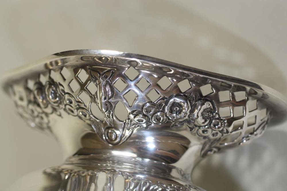 A LATE VICTORIAN SILVER SWEETMEAT BASKET Image