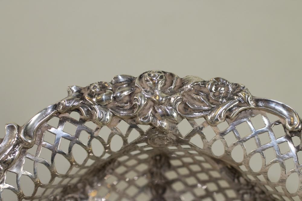 A LATE VICTORIAN SILVER SWEETMEAT BASKET Image