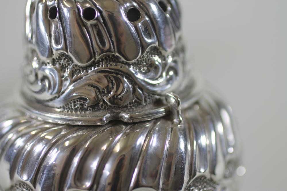 A PAIR OF LATE VICTORIAN SILVER SUGAR CASTORS Image