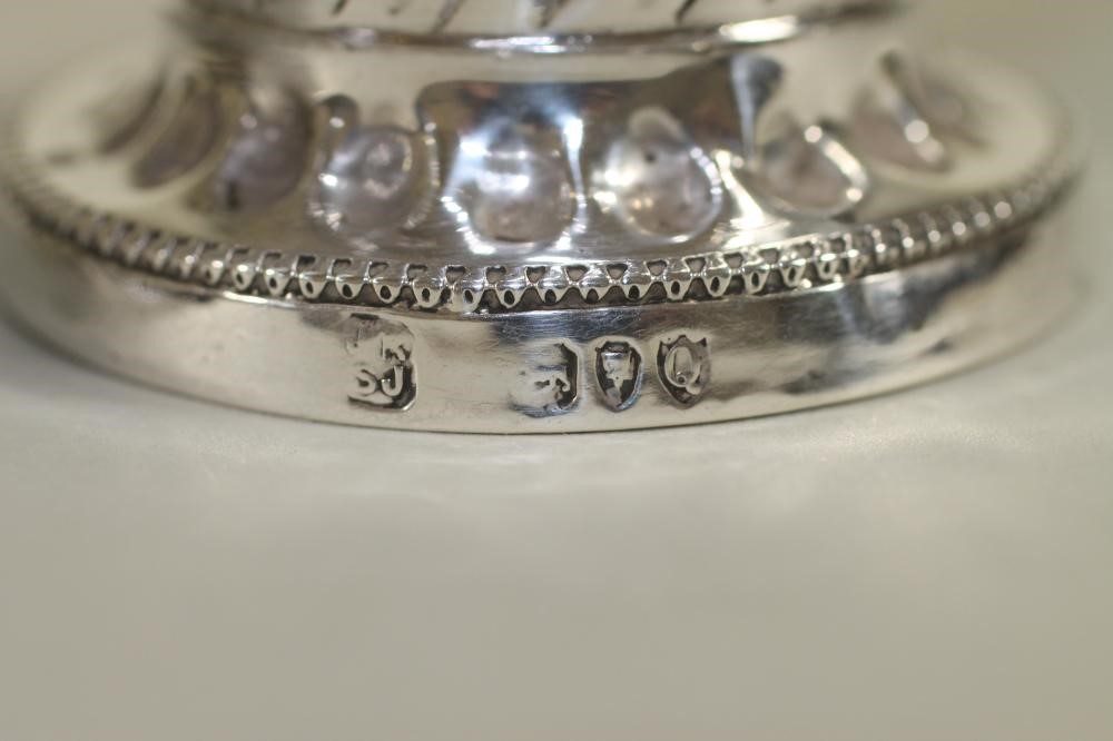 A PAIR OF LATE VICTORIAN SILVER SUGAR CASTORS Image