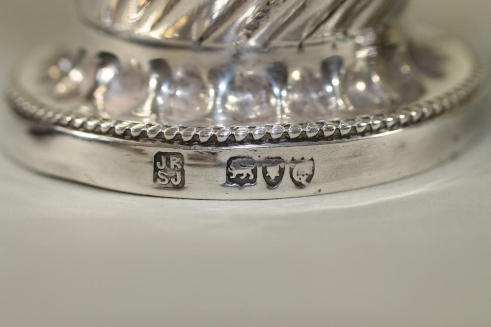 A PAIR OF LATE VICTORIAN SILVER SUGAR CASTORS Image