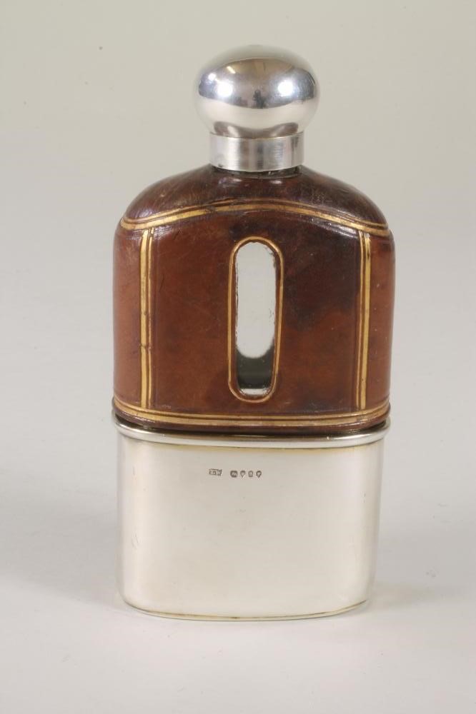 A VICTORIAN GLASS AND SILVER HIP FLASK Image