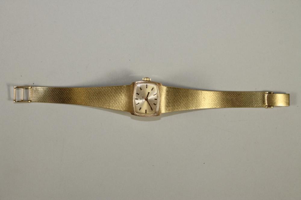 A LADY'S 18KT GOLD REVUE WRISTWATCH Image