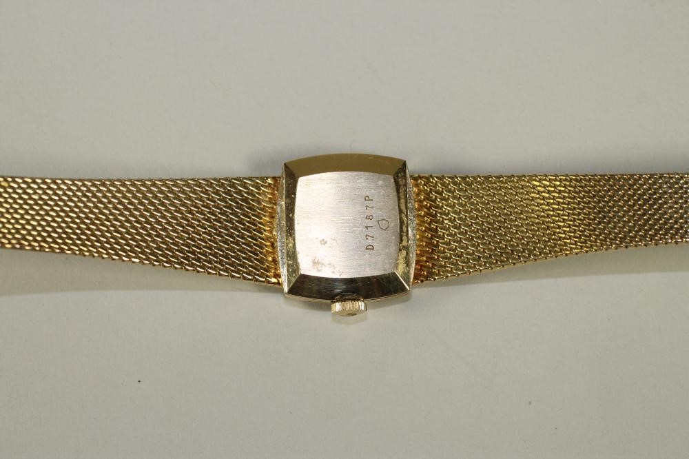 A LADY'S 18KT GOLD REVUE WRISTWATCH Image