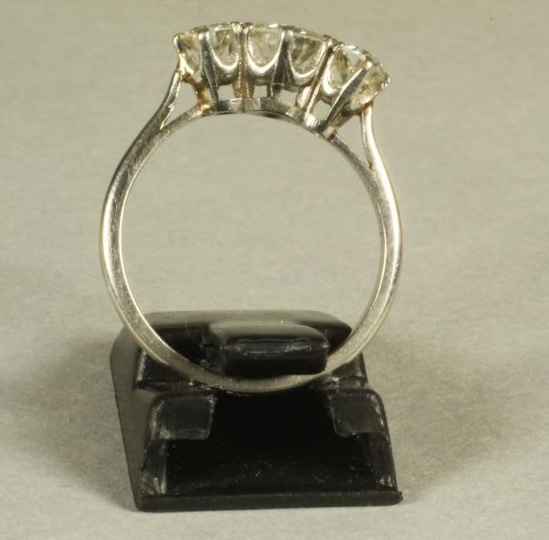 A THREE STONE DIAMOND RING Image