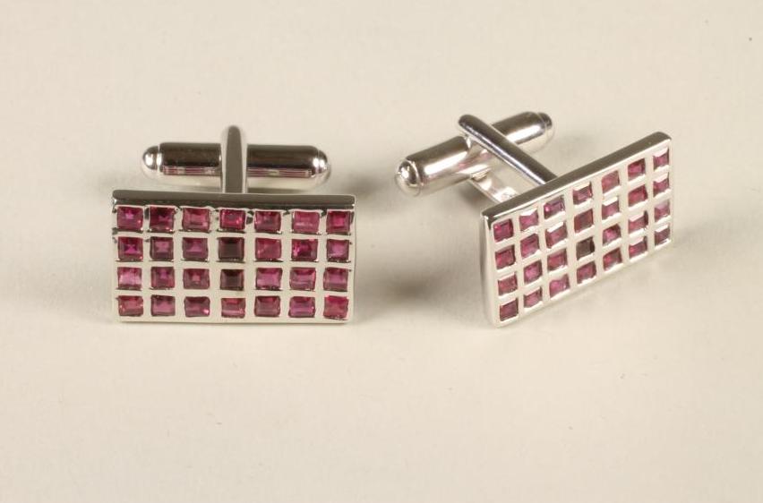 A PAIR OF RUBY CUFFLINKS Image