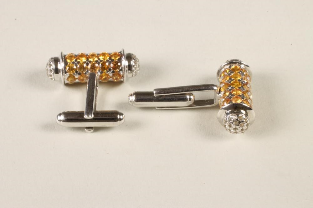 A PAIR OF YELLOW SAPPHIRE CUFFLINKS of barrel form Image