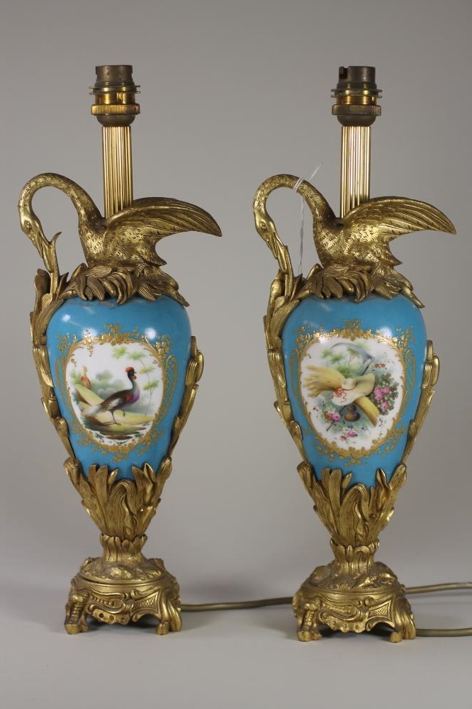 A PAIR OF SEVRES STYLE PORCELAIN GARNITURE EWERS Image