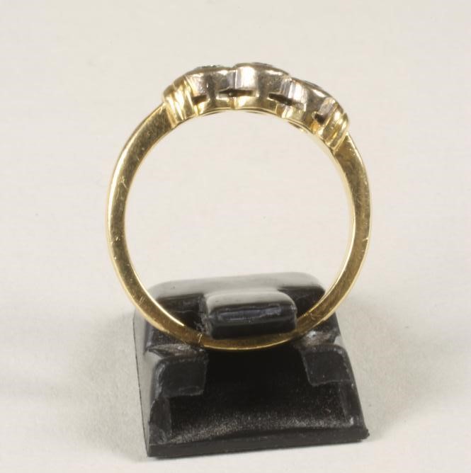 A THREE STONE DIAMOND RING Image