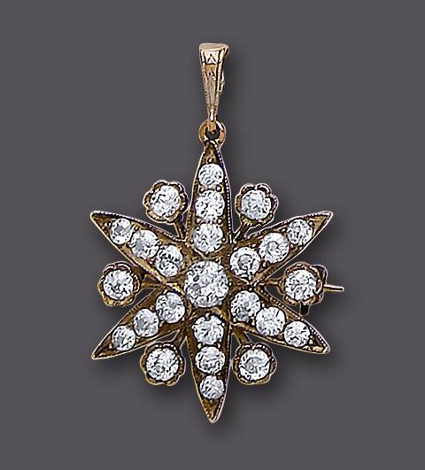 A DIAMOND STAR BROOCH/PENDANT Image