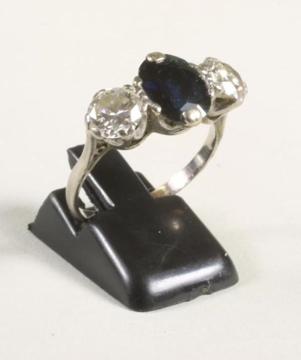 A THREE STONE SAPPHIRE AND DIAMOND RING Image