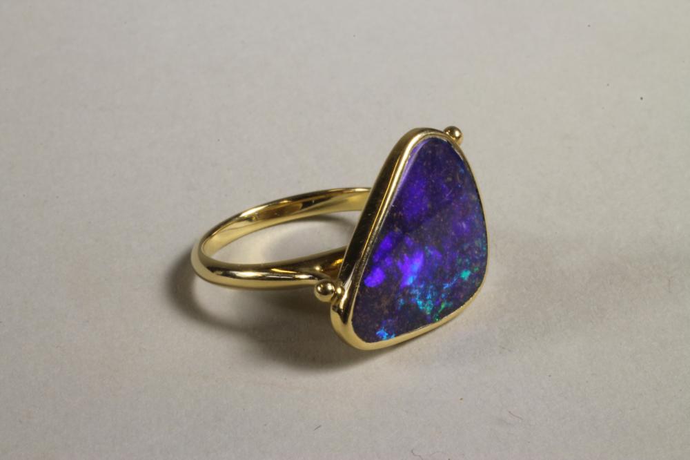 A CONTEMPORARY BLACK OPAL RING Image