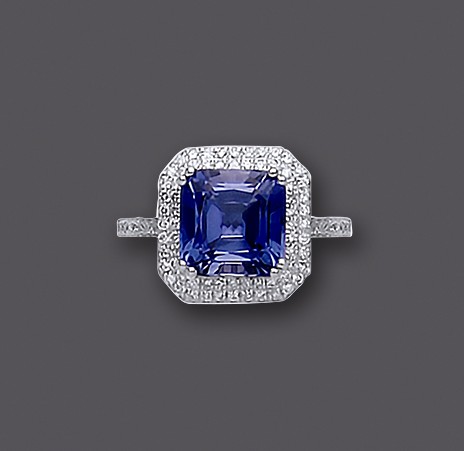 AN ART DECO STYLE SAPPHIRE AND DIAMOND CLUSTER RING Image