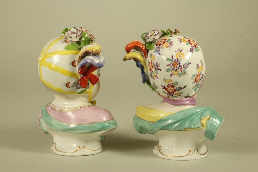 A PAIR OF PASSAU PORCELAIN KINDERBUSTS Image