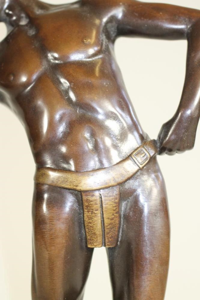 A BRONZE FIGURE OF A MALE NUDE Image