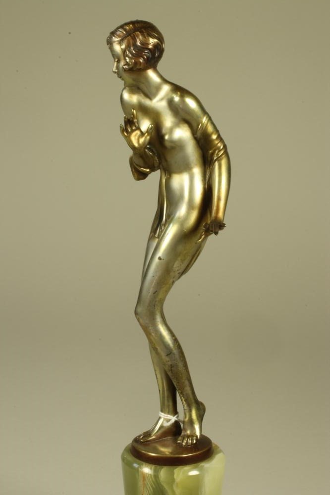 AFTER JOSEF LORENZL - an Art Deco silvered and patinated bronze figure of a nude female with a Image