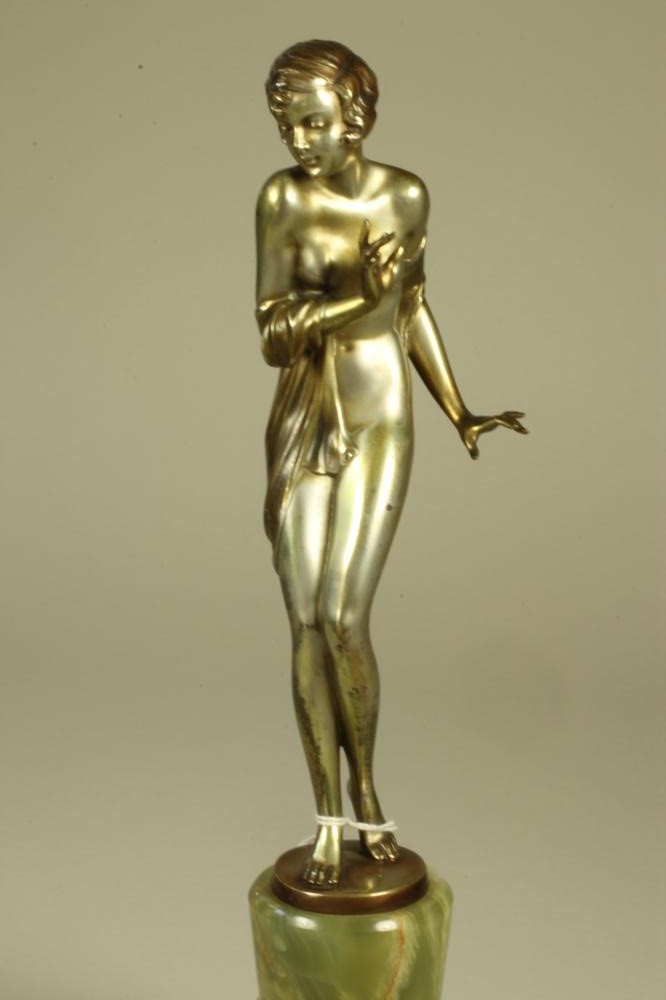 AFTER JOSEF LORENZL - an Art Deco silvered and patinated bronze figure of a nude female with a Image