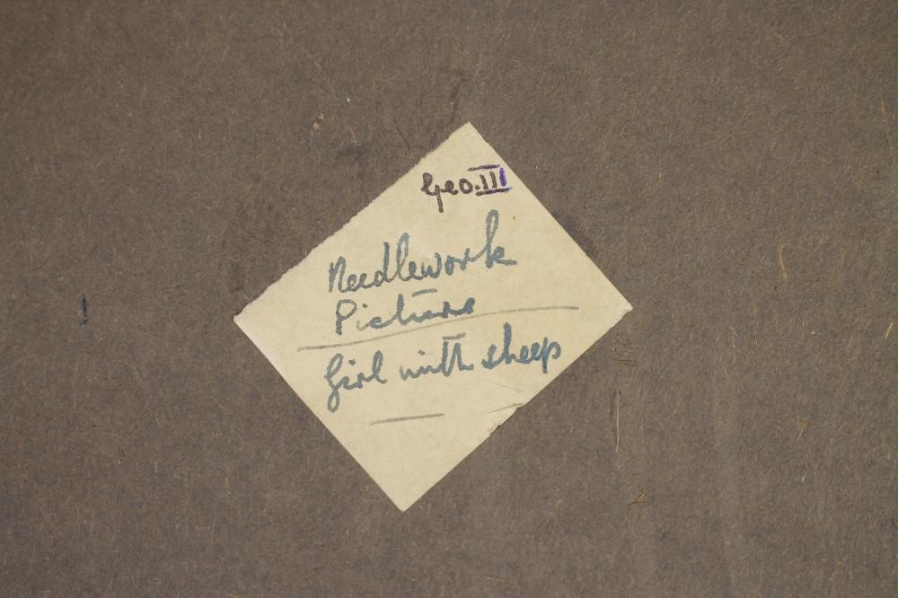 A LATE GEORGE III OVAL SILK PICTURE worked in coloured silks with an Arcadian shepherdess with Image