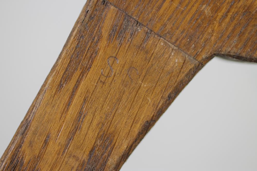 AN OAK FIRE BRUSH carved with a grotesque mask Image