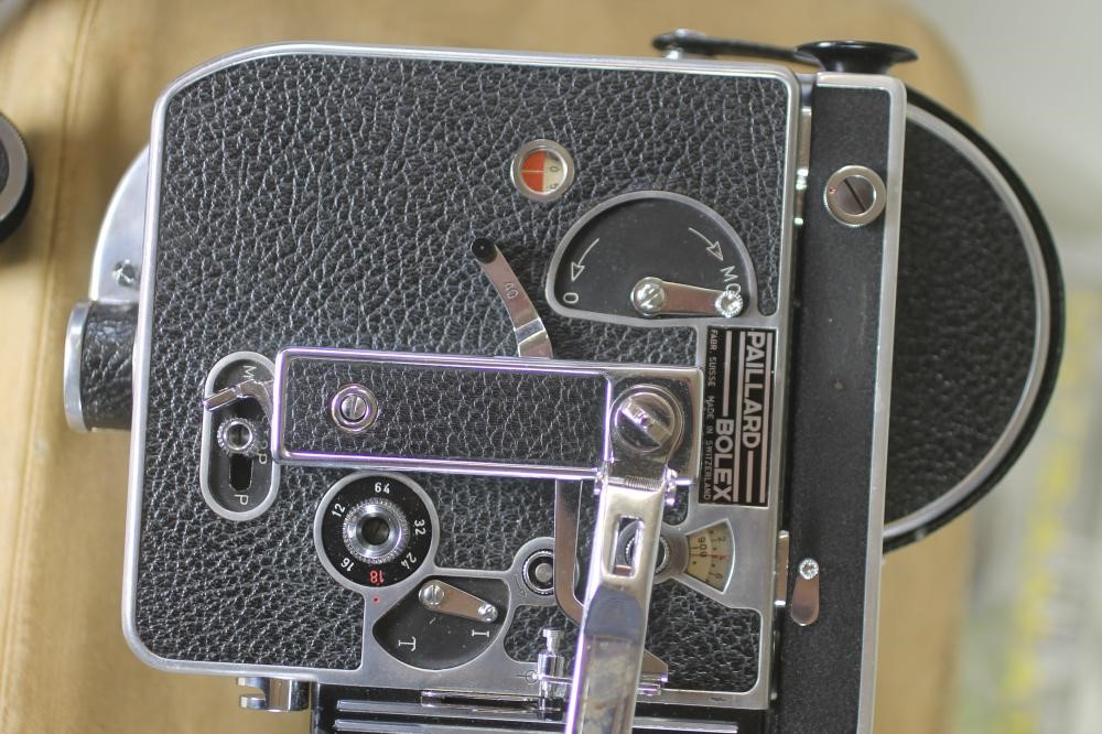 A PAILLARD BOLEX H16 REFLEX CAMERA with 150mm Kern Paillard lens in leather case Image
