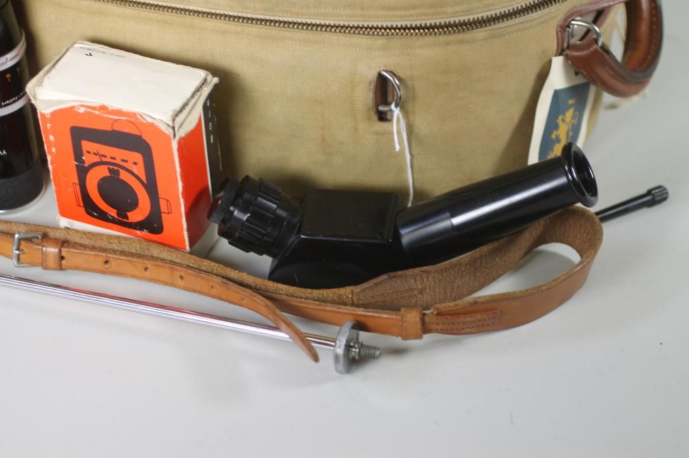 A PAILLARD BOLEX H16 REFLEX CAMERA with 150mm Kern Paillard lens in leather case Image