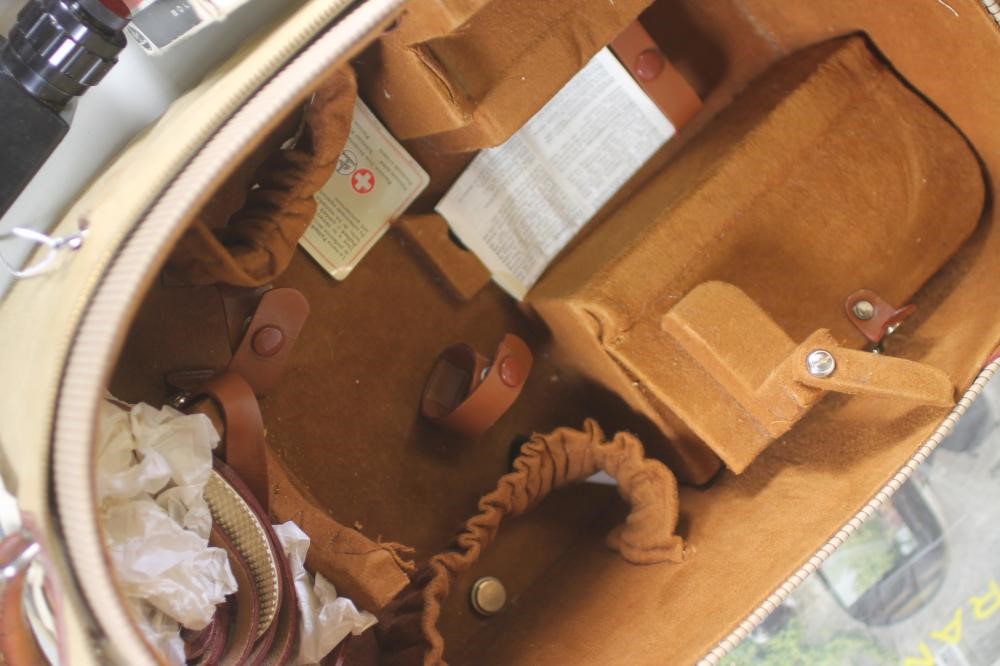 A PAILLARD BOLEX H16 REFLEX CAMERA with 150mm Kern Paillard lens in leather case Image