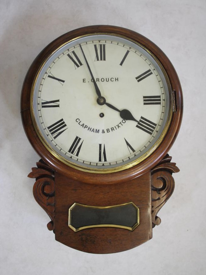 A MAHOGANY CASED DROP DIAL WALL TIMEPIECE Image