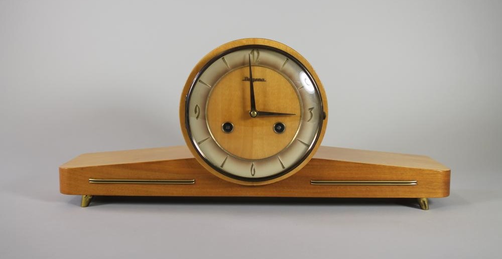 A SATINWOOD CASED GERMAN MANTEL CLOCK by Dugena Image