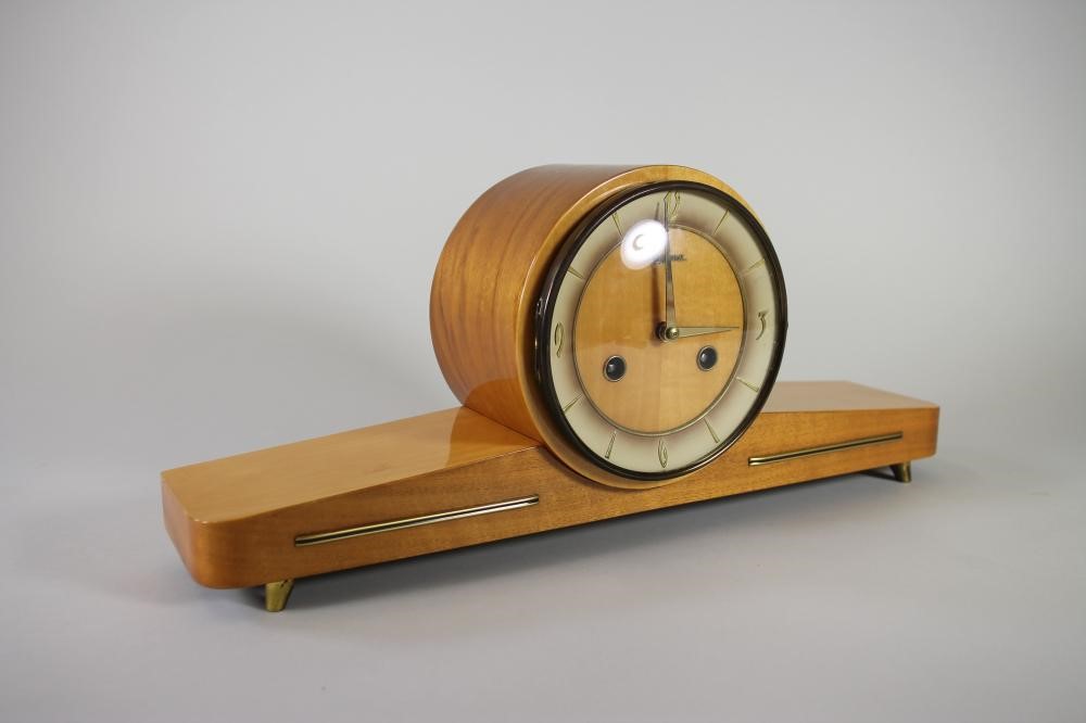 A SATINWOOD CASED GERMAN MANTEL CLOCK by Dugena Image