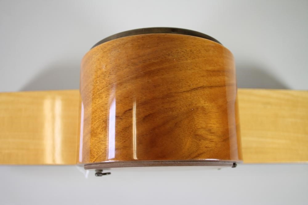 A SATINWOOD CASED GERMAN MANTEL CLOCK by Dugena Image