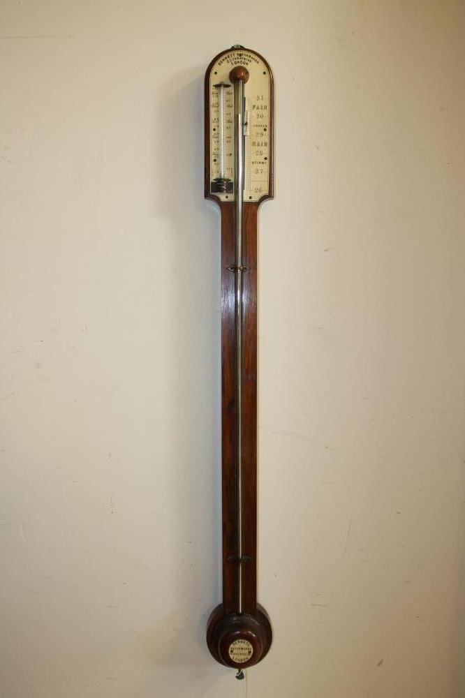 A ROSEWOOD STICK BAROMETER signed Bennett Image