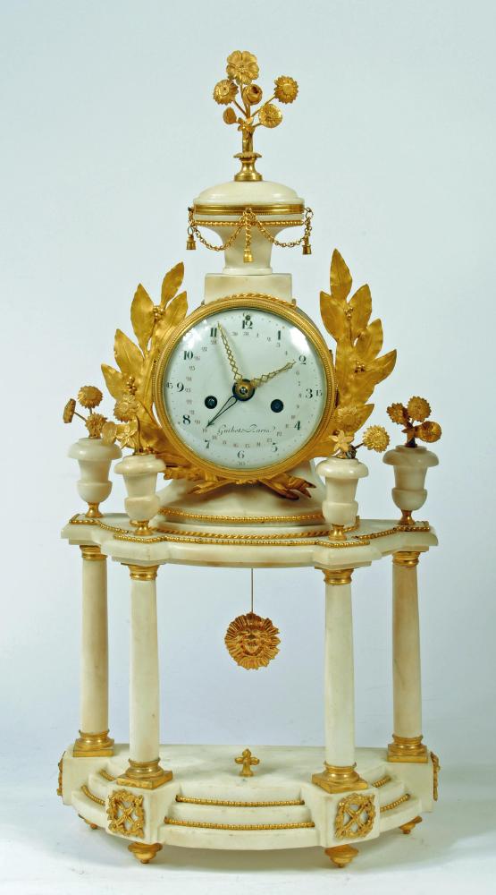 A FRENCH WHITE MARBLE AND ORMOLU MOUNTED PORTICO CLOCK Image