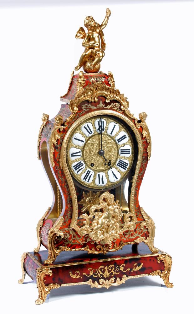 A FRENCH RED "BOULLE" AND GILT METAL TABLE CLOCK by Le Roy et Fils Image