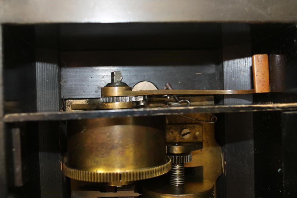 A SWISS WALNUT CASED MUSICAL BOX Image