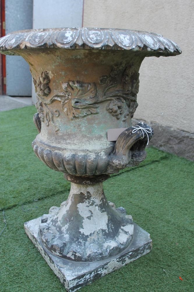 A VICTORIAN TERRACOTTA URN of half fluted campana form with egg and dart moulded rim Image