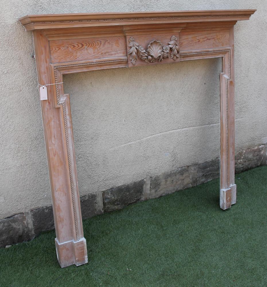 A CARVED PINE CHIMNEY PIECE of Georgian design Image