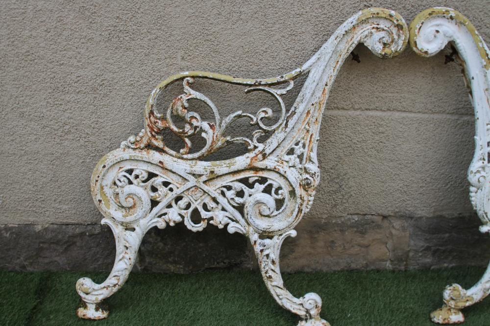 A PAIR OF VICTORIAN CAST IRON BENCH ENDS Image
