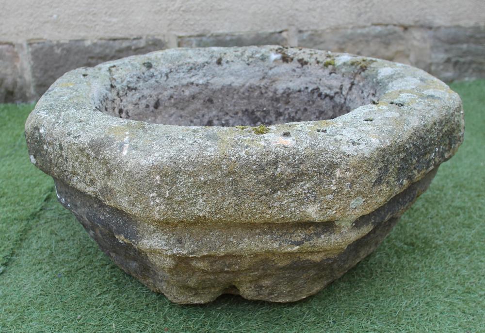 A COMPOSITION STONE PLANT TROUGH of octagonal form with moulded tapering body Image