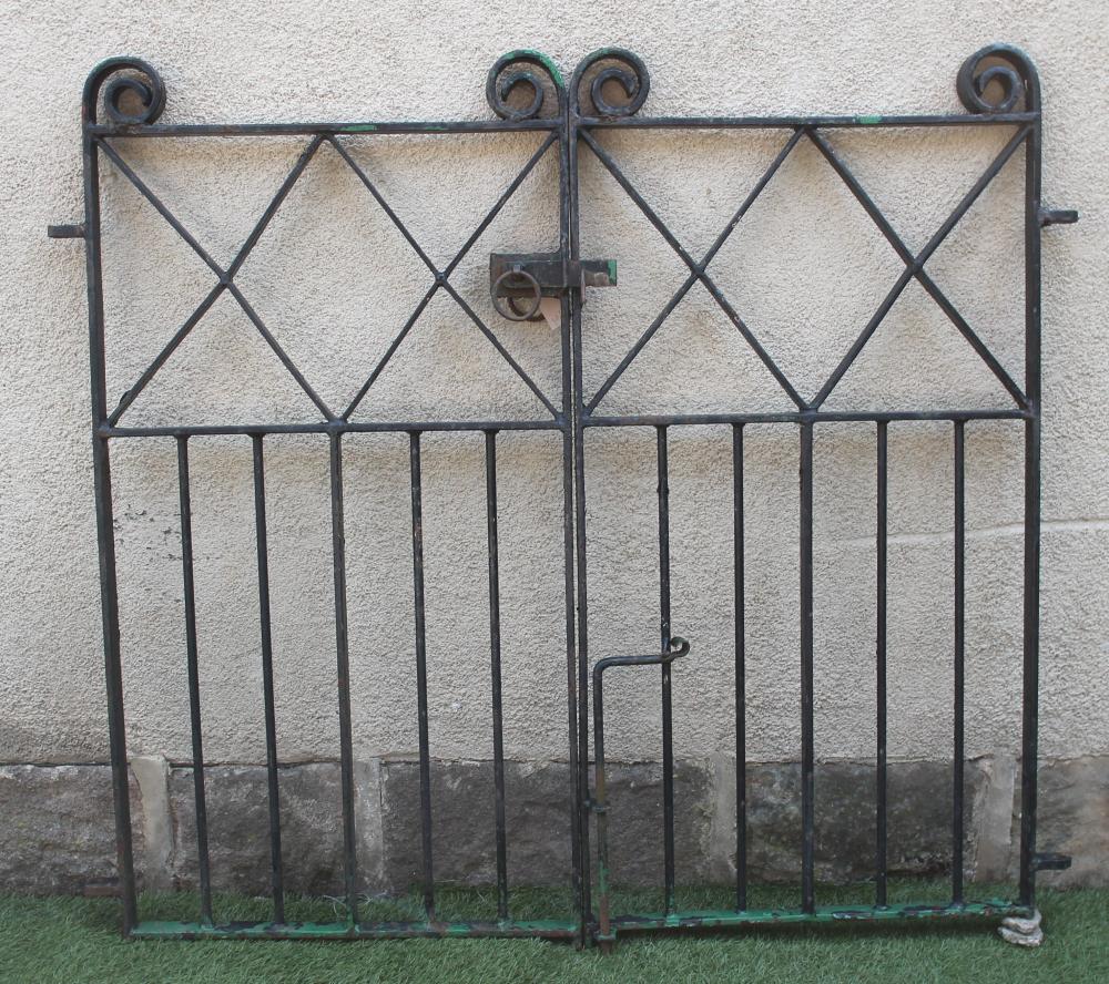 A PAIR OF WROUGHT IRON PEDESTRIAN GATES Image