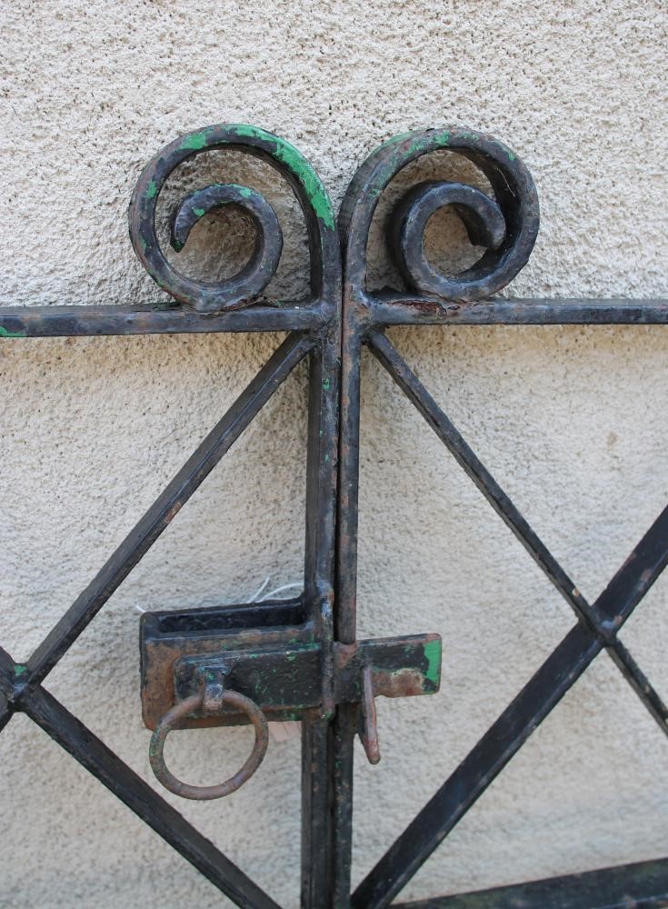 A PAIR OF WROUGHT IRON PEDESTRIAN GATES Image