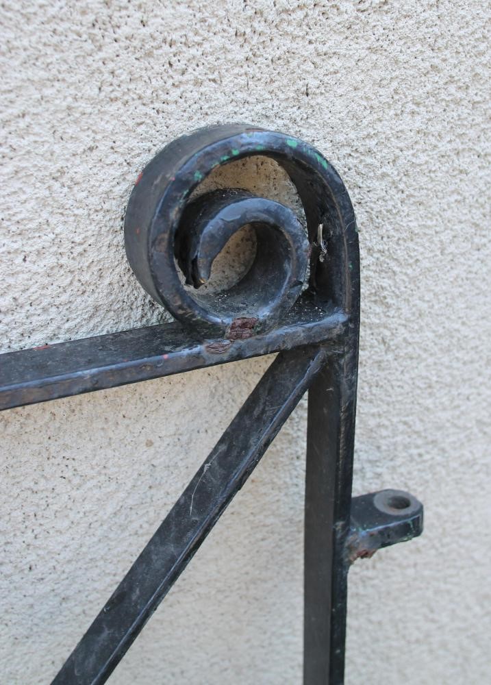 A PAIR OF WROUGHT IRON PEDESTRIAN GATES Image