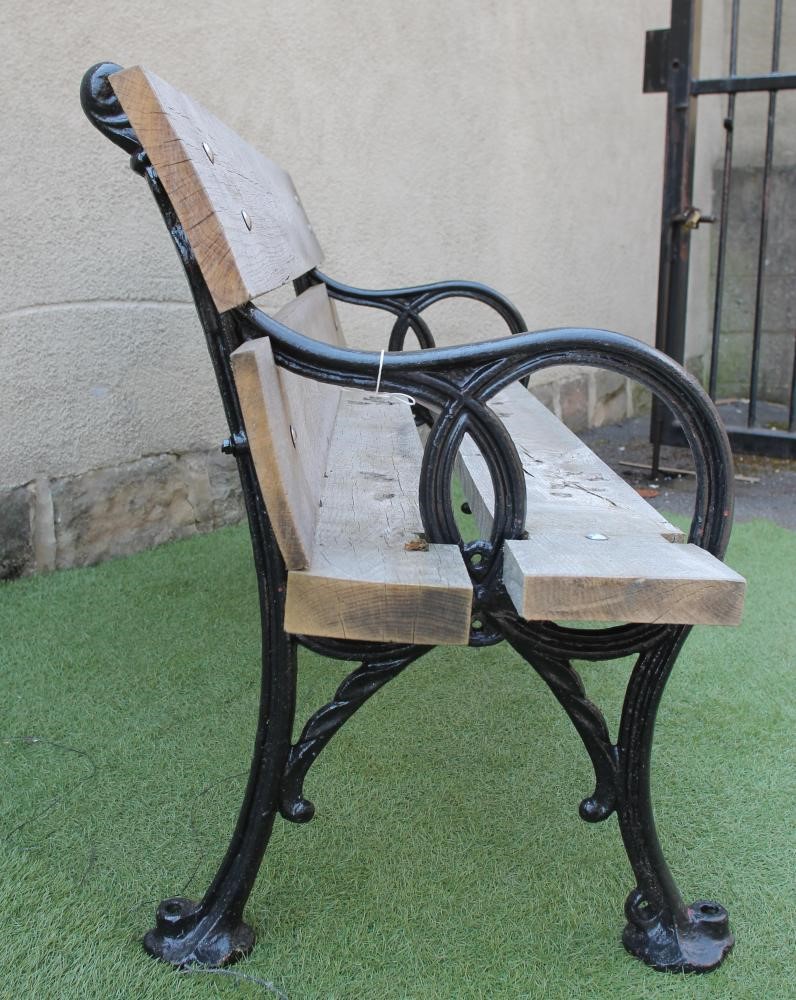 A VICTORIAN CAST IRON PARK BENCH Image