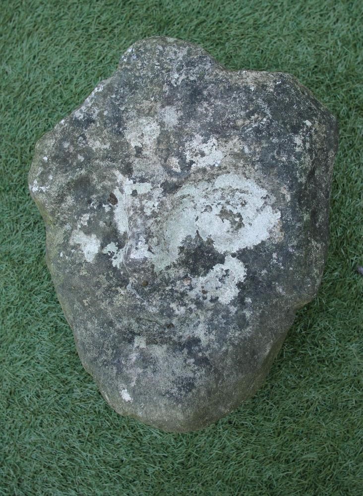 A CARVED SANDSTONE HUMAN HEAD Image